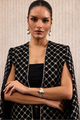 The Luminescent Lattice Cape